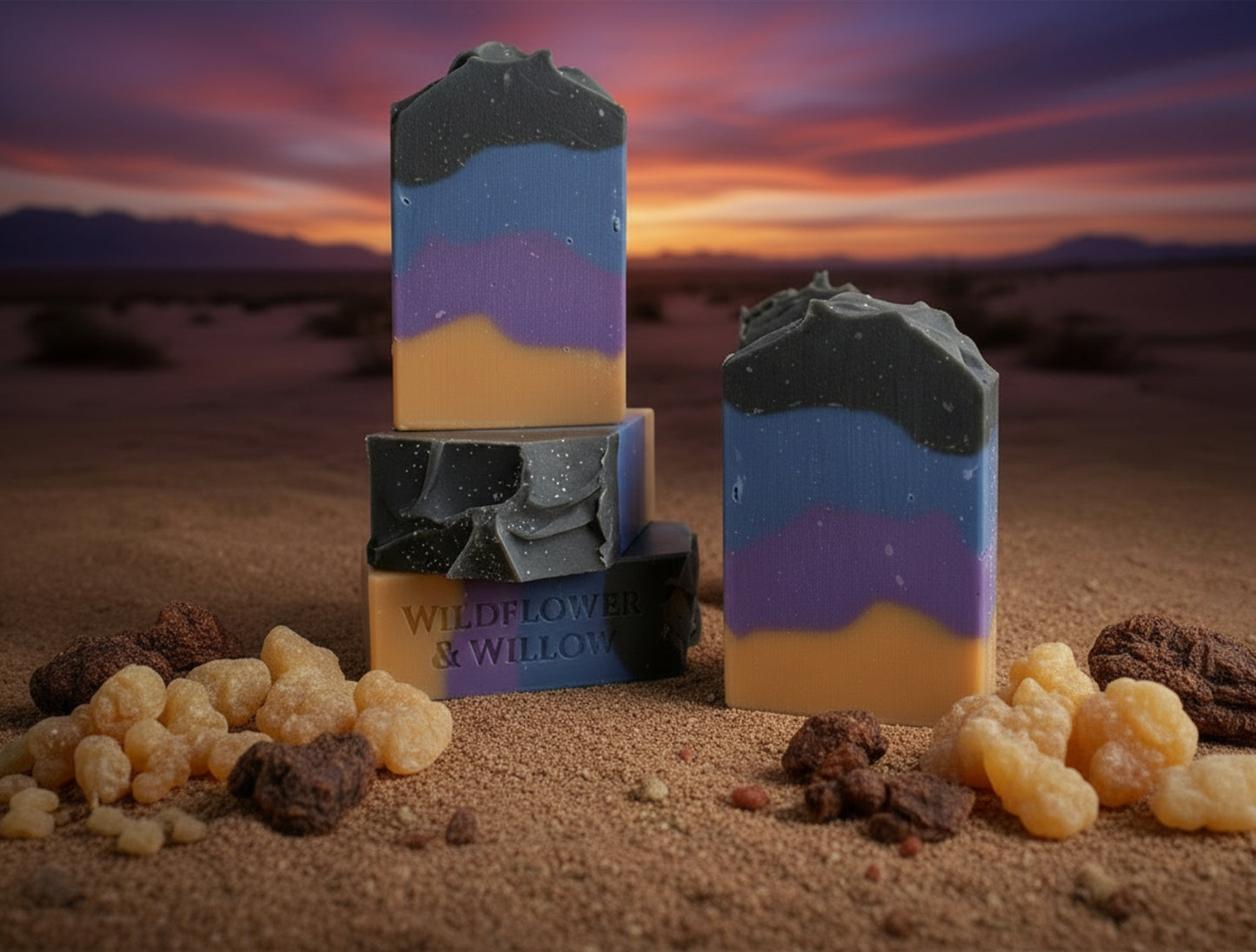 colorful bars of soap on sand